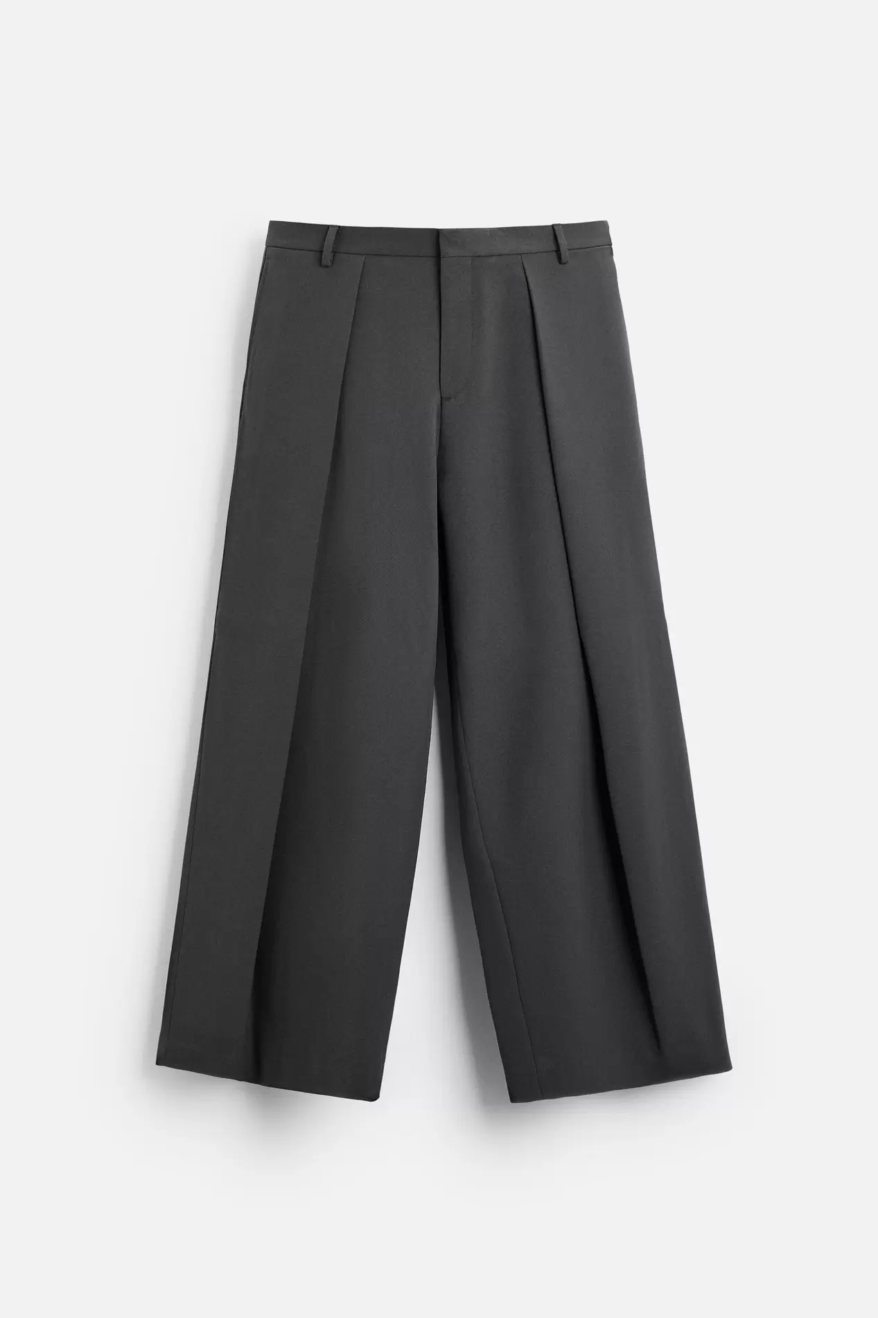 Wide fit pants. Front pleats at waist. Side pockets and back welt pockets. Front zip and hidden metal hook closure. offers at $79.9 in ZARA