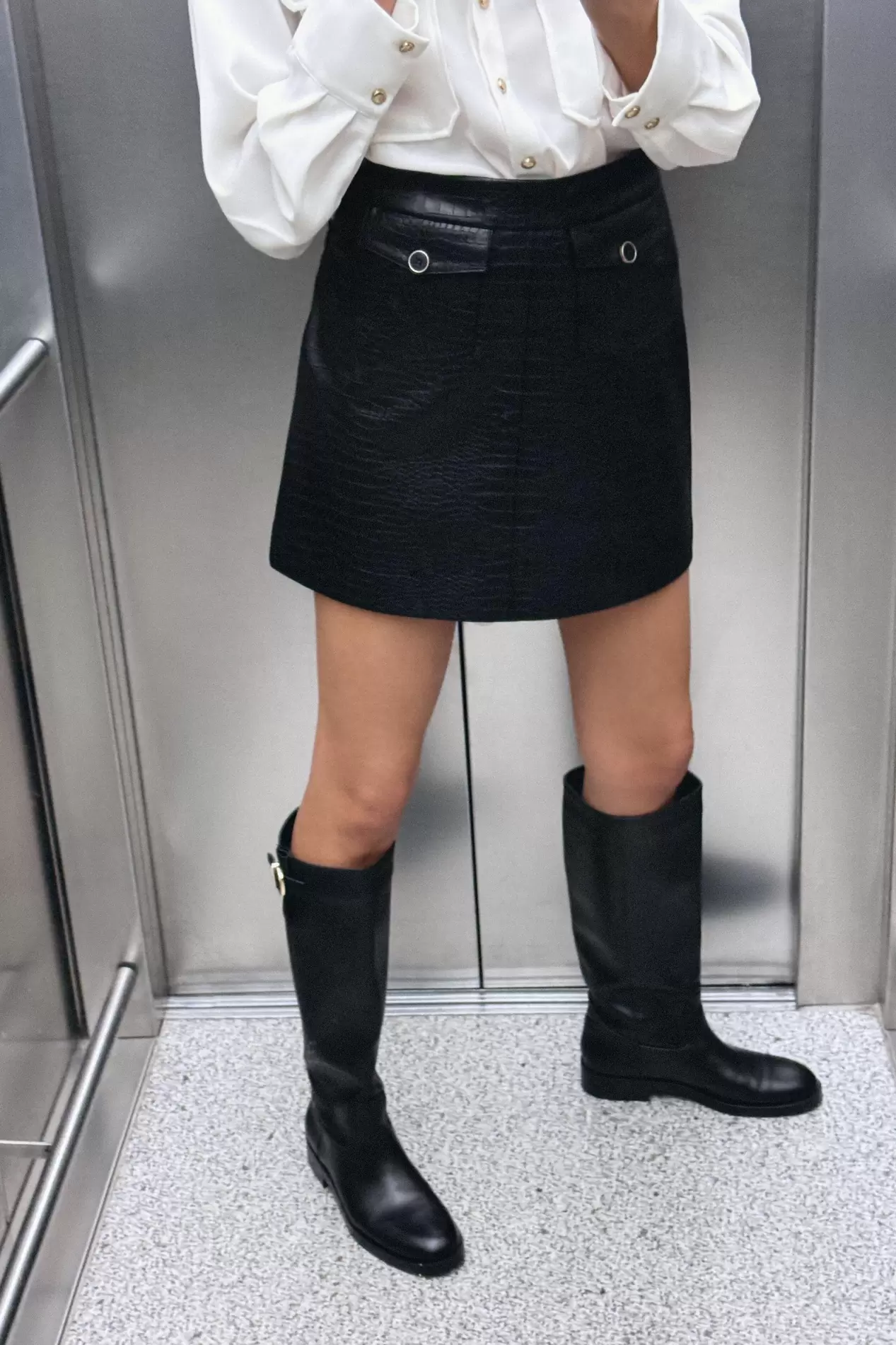 FAUX LEATHER MINI SKIRT offers at $55.9 in ZARA