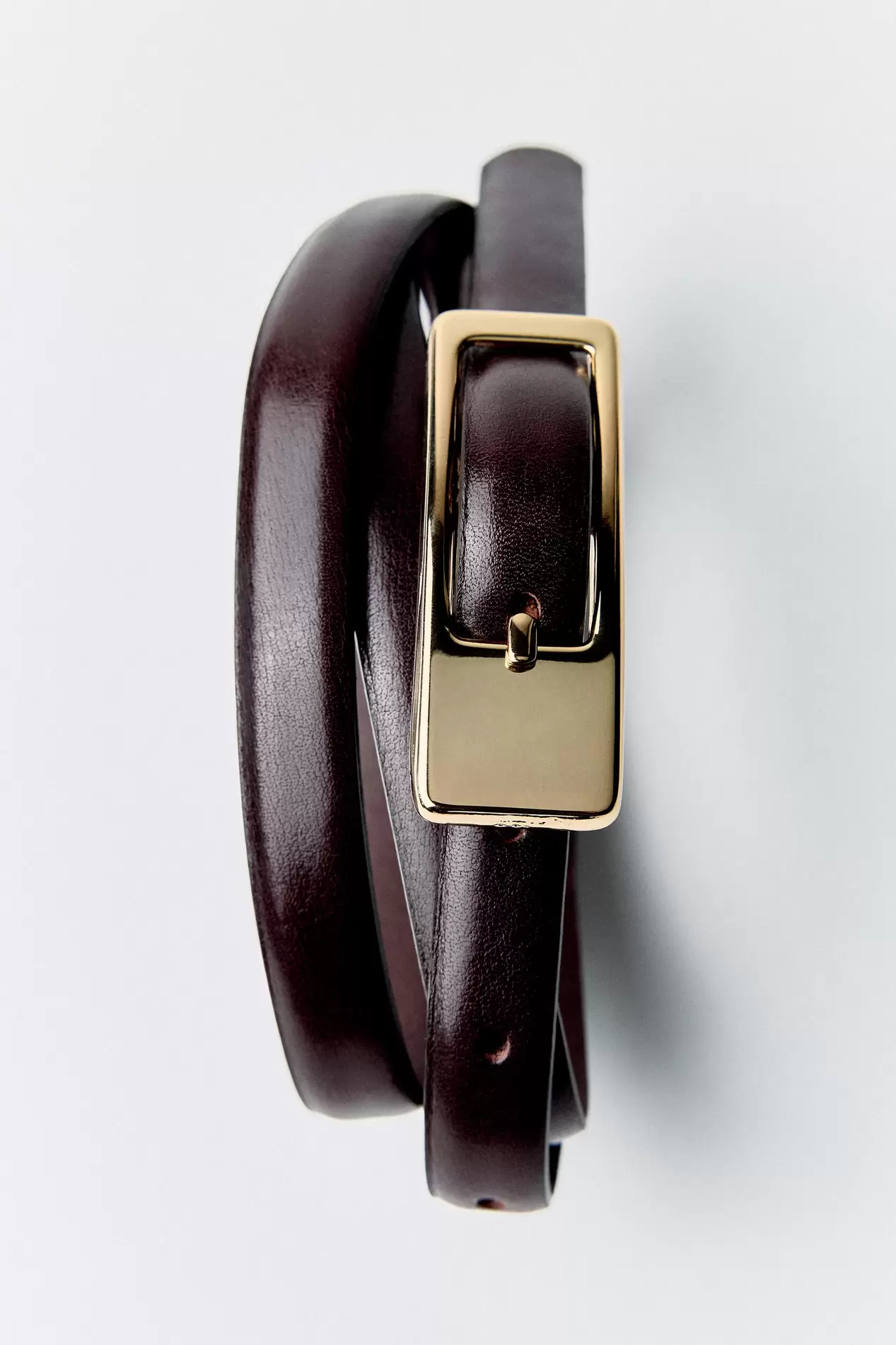 RECTANGULAR BUCKLE THIN BELT offers at $39.9 in ZARA