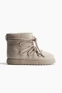 Laced Padded Boots offers at $74.99 in H&M