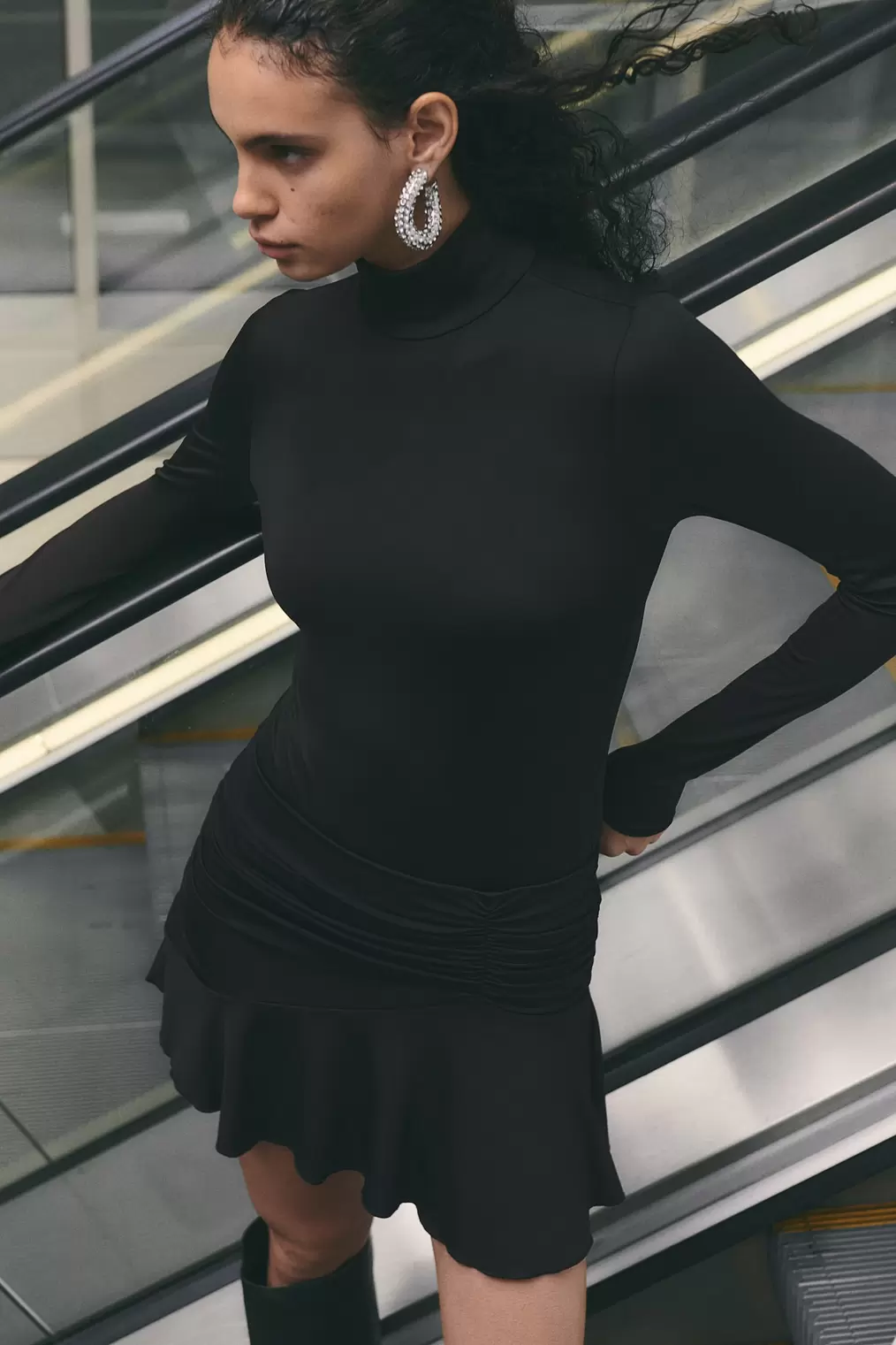 Turtleneck Bodysuit offers at $24.99 in H&M