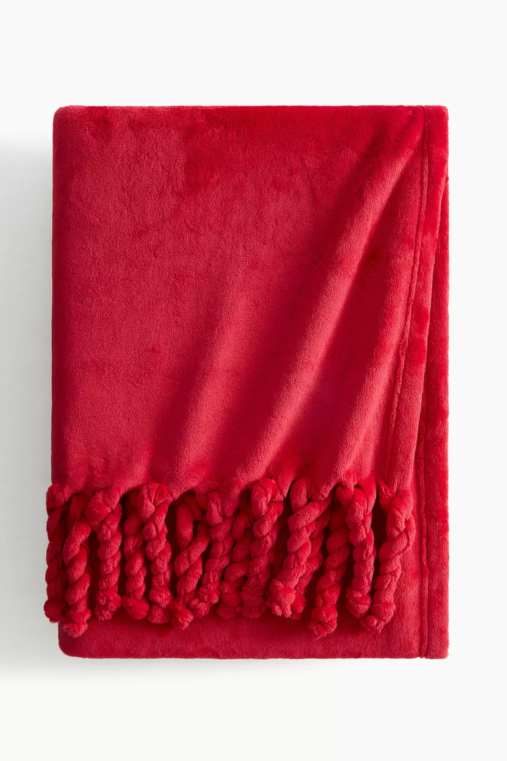 Fringed Throw offers at $29.99 in H&M