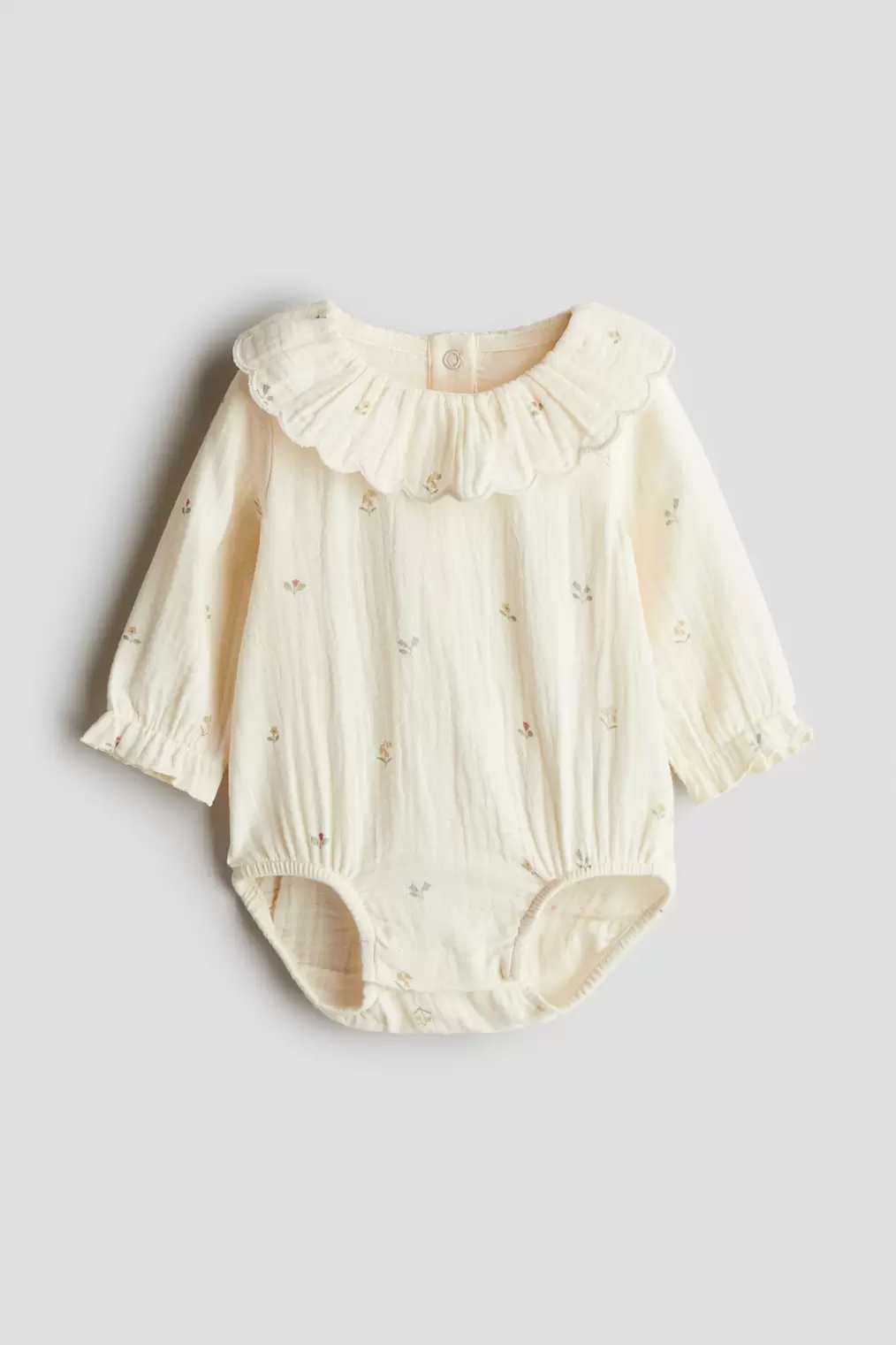 Cotton Muslin Romper Suit offers at $19.99 in H&M