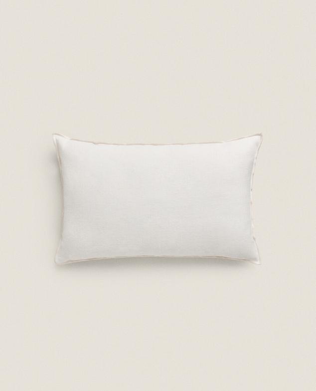 THROW PILLOW COVER WITH OVERLOCK offers at $49.9 in ZARA HOME