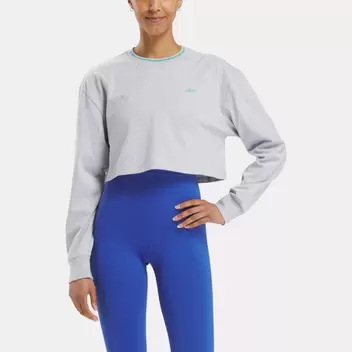 Team long sleeve crop top offers at $55 in Reebok