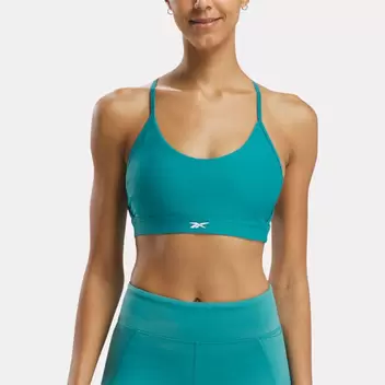 Lux strappy sports bra offers at $85 in Reebok