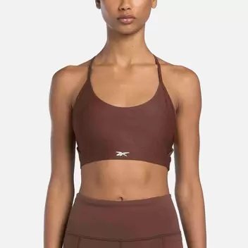 Lux strappy sports bra offers at $85 in Reebok