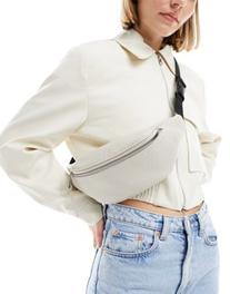 ASOS DESIGN textured fanny pack in cream offers at $20 in Asos