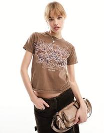 Reclaimed Vintage americana baby tee in washed brown offers at $34.99 in Asos