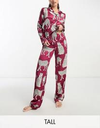 Chelsea Peers Tall premium Christmas satin camp collar top and pants pajama set in wine leopard print offers at $84 in Asos