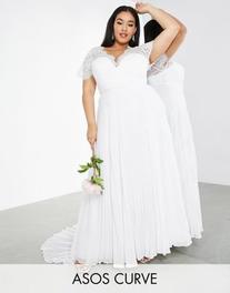 ASOS DESIGN Curve Sophia plunge lace wedding dress with pleated skirt in ivory offers at $98 in Asos