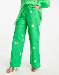 Never Fully Dressed wide leg pants in green metallic shell - part of a set offers at $79.5 in Asos