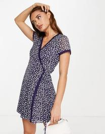 ASOS DESIGN mini mesh wrap dress with lace trim in navy daisy print offers at $12 in Asos