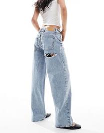 ASOS DESIGN baggy boyfriend jeans in light tint with cheeky rip offers at $52.99 in Asos
