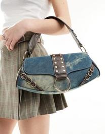ASOS DESIGN shoulder bag in washed denim with hardware in blue offers at $37.99 in Asos