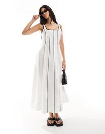 ASOS DESIGN seamed maxi tennis sundress in ivory with contrast binding offers at $44.99 in Asos