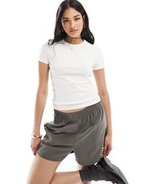 & Other Stories short sleeve ribbed fitted top in white offers at $33 in Asos