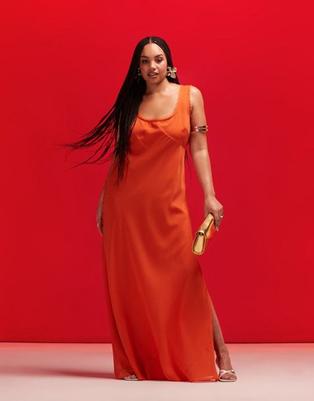 ASOS DESIGN Curve scoop neck raw edge bias maxi dress in burnt orange offers at $64.99 in Asos