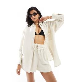 ASOS DESIGN Isabel mix & match linen look oversize beach shirt in neutral offers at $37.99 in Asos