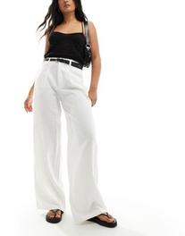 Stradivarius belted linen mix pants in white offers at $45.9 in Asos