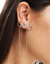 ASOS DESIGN stud earrings with chain bow detail in silver tone offers at $11.99 in Asos