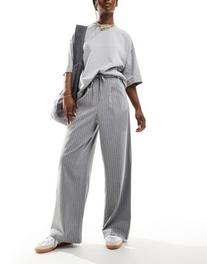 ASOS DESIGN tailored pull on pants in gray pinstripe offers at $27.99 in Asos