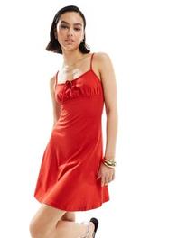 ASOS DESIGN cami ruched bust mini dress with flare hem in red offers at $14.99 in Asos