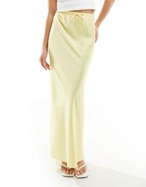ASOS DESIGN satin bias tie waist maxi skirt in buttermilk offers at $49.99 in Asos