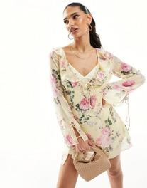 Love Triangle mini dress with ruffle detail in yellow floral offers at $82 in Asos
