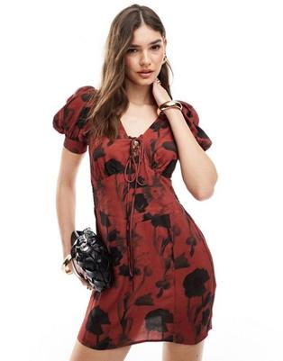 ASOS DESIGN puff sleeve lace up mini dress in red vintage floral offers at $34 in Asos