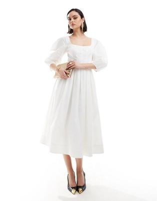 & Other Stories midaxi dress with volume sleeves and corset detail in white offers at $172 in Asos