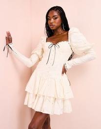 ASOS LUXE broderie corseted mini dress with black tie detail in white offers at $104.5 in Asos