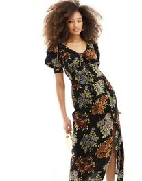ASOS DESIGN puff sleeve lace up midi dress in black vintage floral offers at $52.99 in Asos
