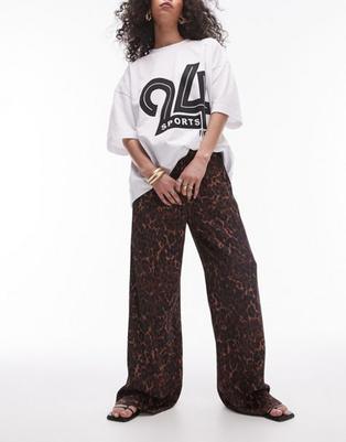 Topshop leopard print satin straight leg tie waist pants in light leopard offers at $74.99 in Asos