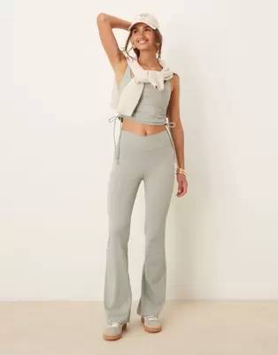 Tala DayFlex wrap flared leggings in sage green offers at $94 in Asos