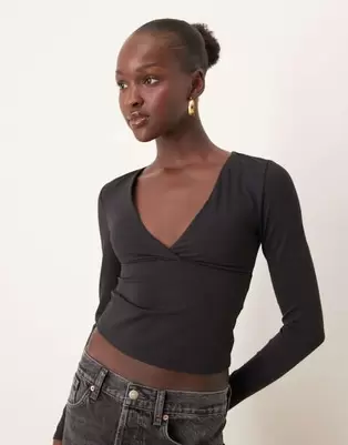 TALA DayFlex v neck long sleeve top in black offers at $58 in Asos