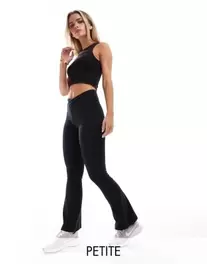 ASOS 4505 Petite soft touch slim kick leggings with wrap waist in black offers at $35 in Asos