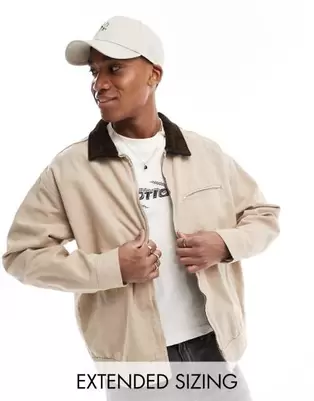 ASOS DESIGN oversized harrington jacket in washed stone offers at $69.99 in Asos