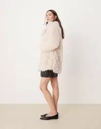 Glamorous fluffy faux fur boxy coat offers at $167 in Asos