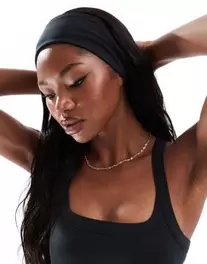 ASOS 4505 Icon soft touch pilates wide headband in black offers at $9 in Asos