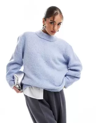 ASOS DESIGN oversized crew neck sweater in blue offers at $42.99 in Asos