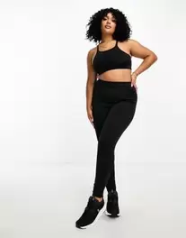 ASOS 4505 Curve Icon running tie waist gym legging with phone pocket in black offers at $28 in Asos