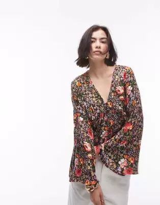 Topshop jacquard button front flute sleeve blouse in floral multi offers at $11 in Asos