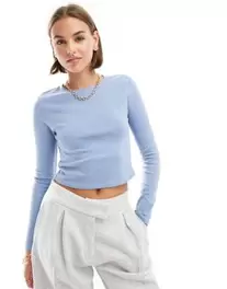 Stradivarius round neck long sleeve cotton t-shirt in blue offers at $14.5 in Asos