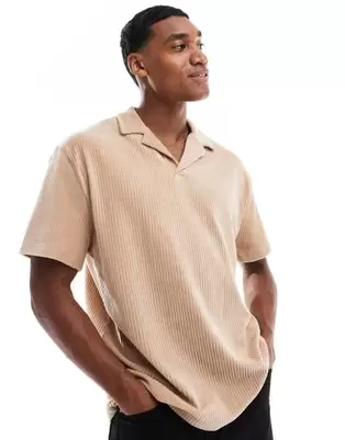 ASOS DESIGN relaxed ribbed velour polo shirt with camp collar in hummus offers at $9 in Asos