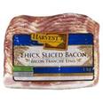 Harvest Thick Sliced Bacon offers at $24.99 in Calgary Co-op