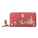 Mickey Mouse Family Christmas Dooney & Bourke Wristlet Wallet offers at $188 in Disney Store