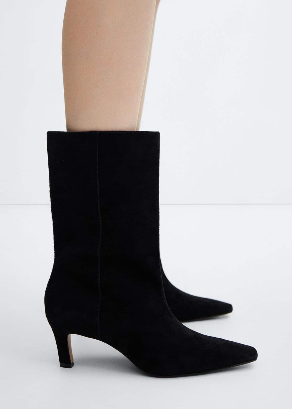 Leather boots with kitten heels offers at $129.99 in Mango