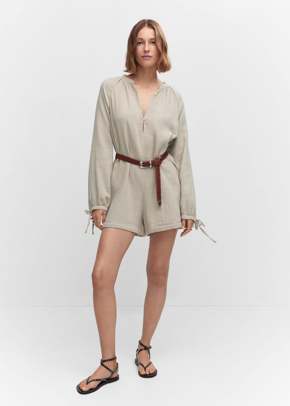 Short jumpsuit with buttons offers at $39.99 in Mango
