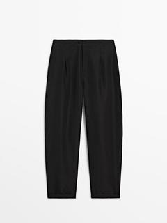 Darted carrot fit trousers offers at $149 in Massimo Dutti